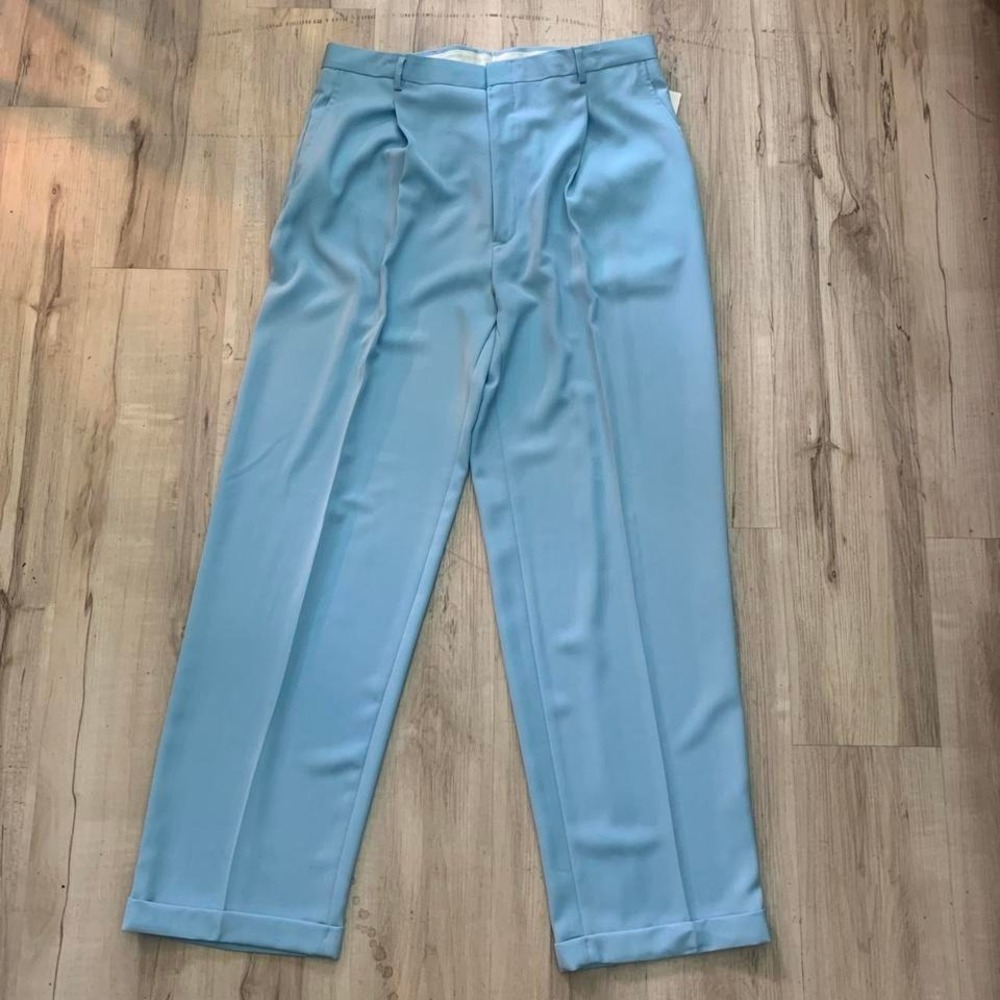 Vintage 1990s light blue tailored trousers with a relaxed fit